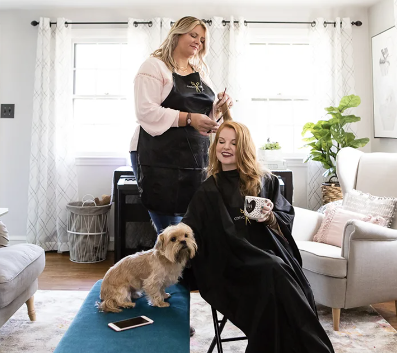 Stylist providing house-call hair services